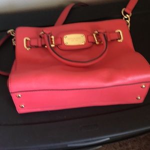 Salmon colored Michael Kors purse